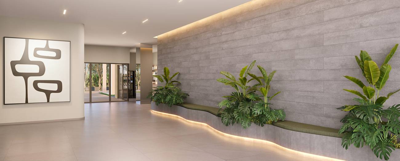 Perspectiva ilustrada do lobby, com parede de pedra e jardim linear iluminado