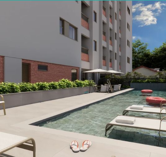 Perspectiva ilustrada da piscina com deck e espreguiçadeiras junto à torre